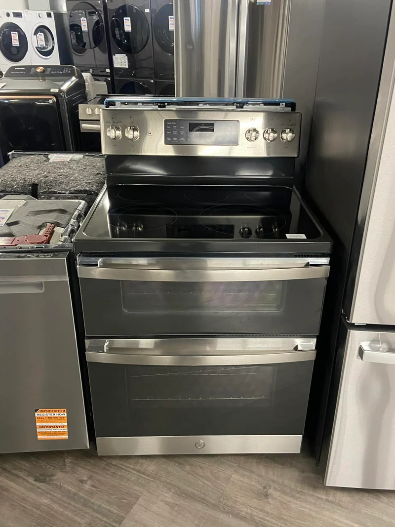 Ge 30 po 6.6 pi.cu - Cuisinière Éléctrique- Double Four - 5 brûleurs - Inox - JBS86SPSS - Boîte ouverte