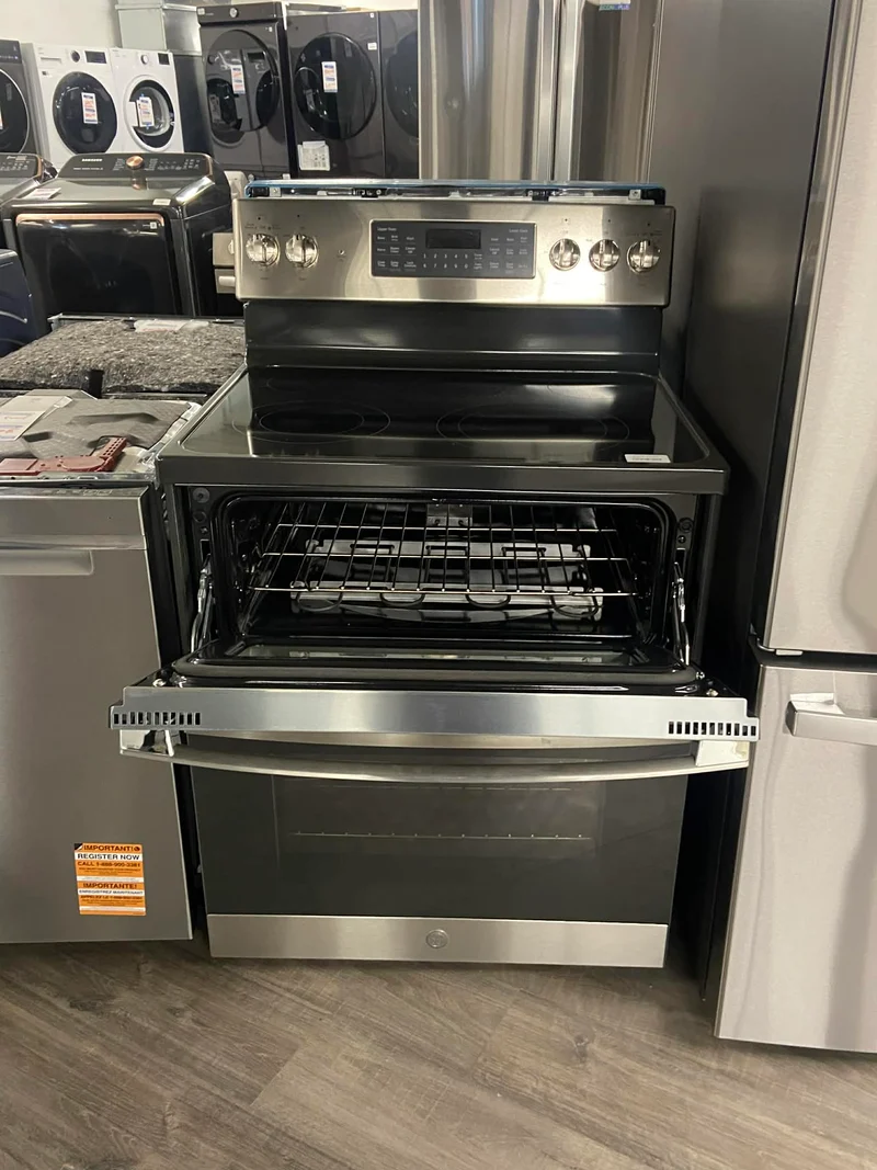 Ge 30 po 6.6 pi.cu - Cuisinière Éléctrique- Double Four - 5 brûleurs - Inox - JBS86SPSS - Boîte ouverte