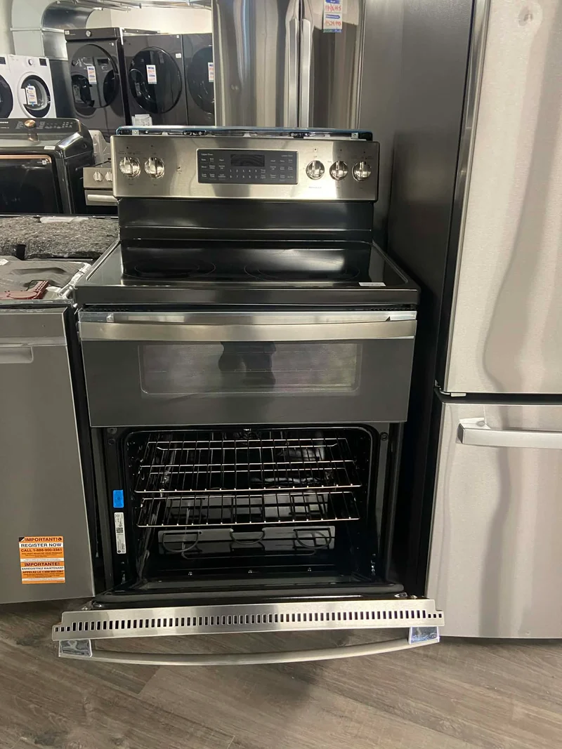 Ge 30 po 6.6 pi.cu - Cuisinière Éléctrique- Double Four - 5 brûleurs - Inox - JBS86SPSS - Boîte ouverte