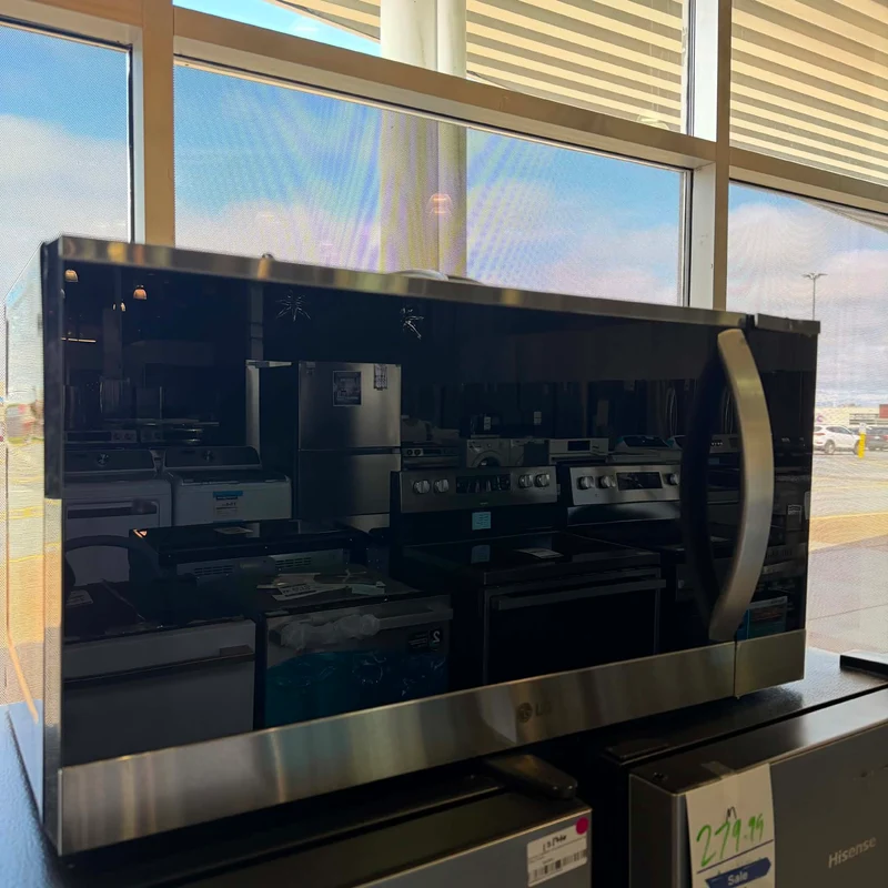 LG 30''1.8 pi cu Micro-onde à Hotte Intégrée- Inox - MVEM1825F - Boîte ouverte