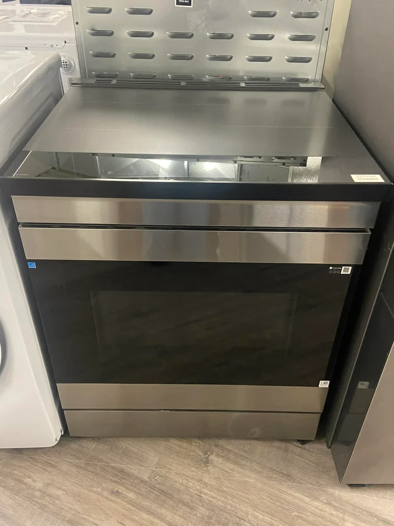 Samsung 30" 6.3 pi.cu - Cuisinière encastrable à Induction - Convection avec le mode Friture à air - Inox - NSI6DG9900SRAC - Boite Ouverte