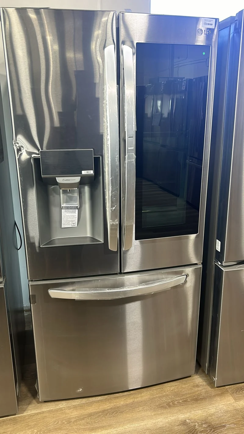 LG 33''24.4 pi. cu. -Réfrigérateur à 2 battants- inox- energy star- machine eau et glace-LRFVS2503S-Boîte ouverte