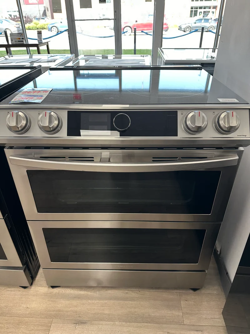 Samsung 30'' 6.3 pi.cu. cuisinière - 5 brûleurs - 2 Four - inox - NE63T8751S- boîte ouverte